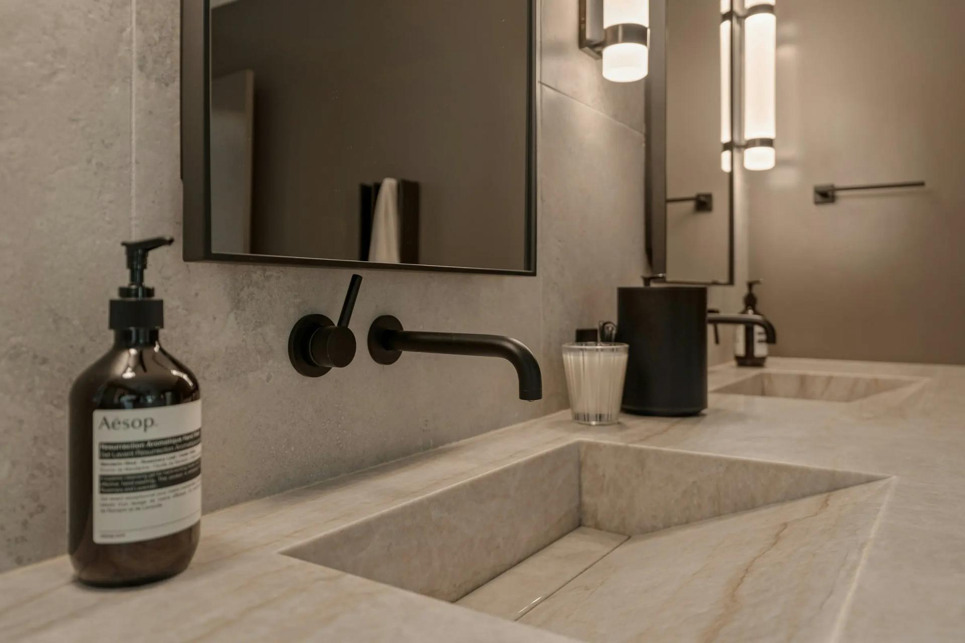 A stone basin in a freshly cleaned bathroom