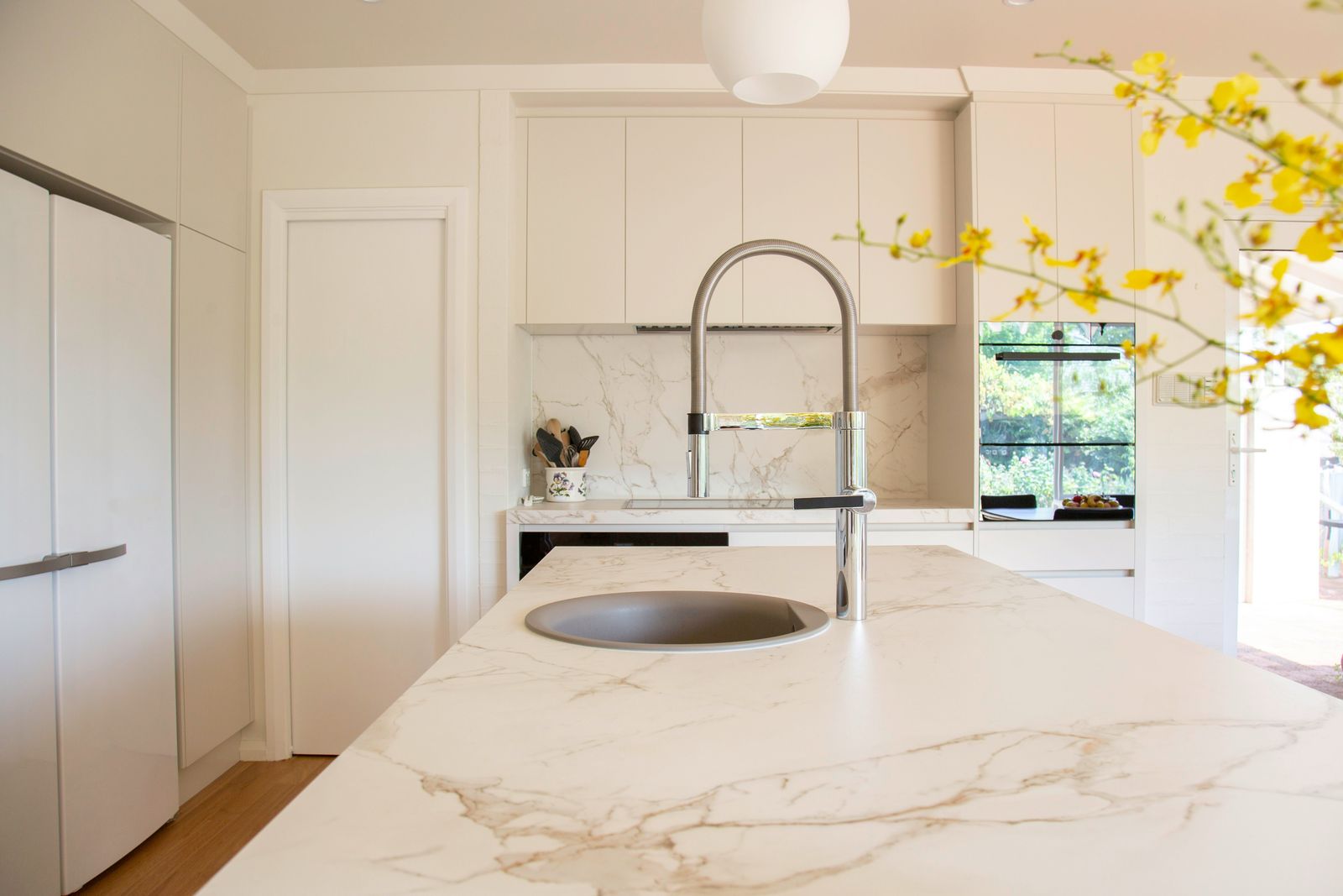 A marble kitchen island, cleaned and clear